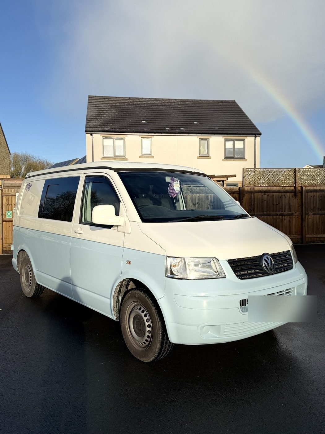 Two-tone VW Transporter, finished paintwork, front three-quarter view